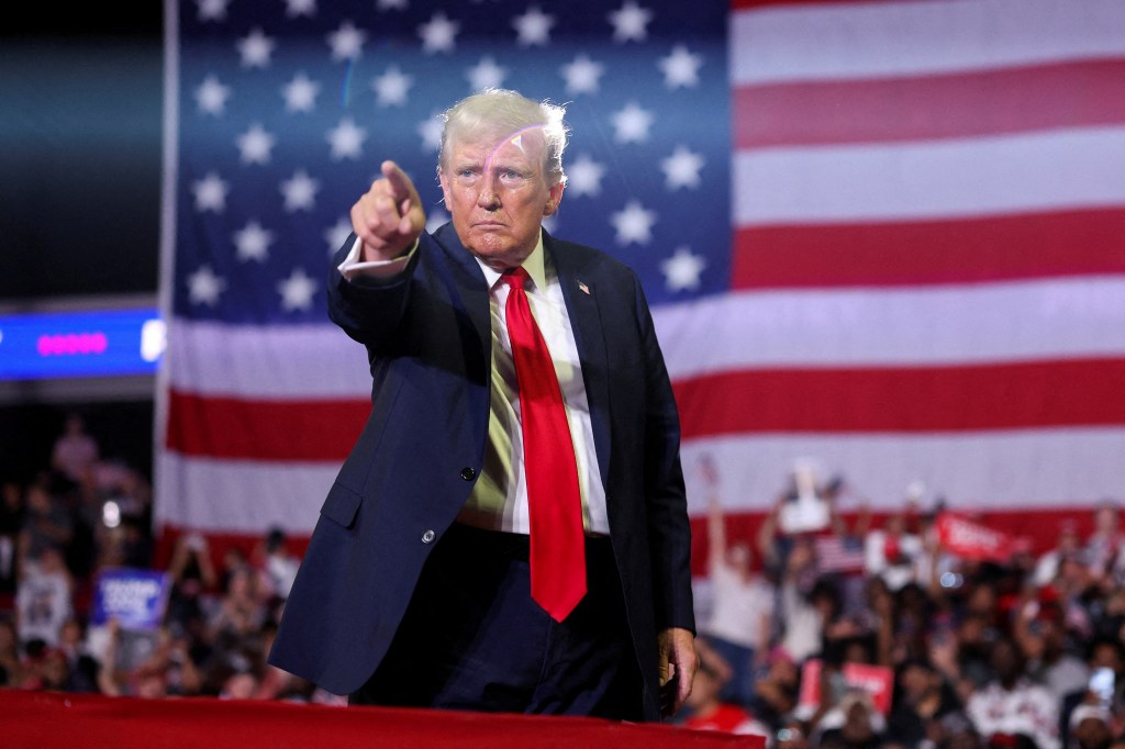 Former President and Donald Trump gestures during a campaign event in Philadelphia, Pennsylvania, on June 22, 2024.