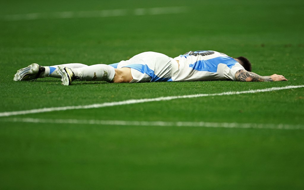 Lionel Messi laid on the field after failing to score.
