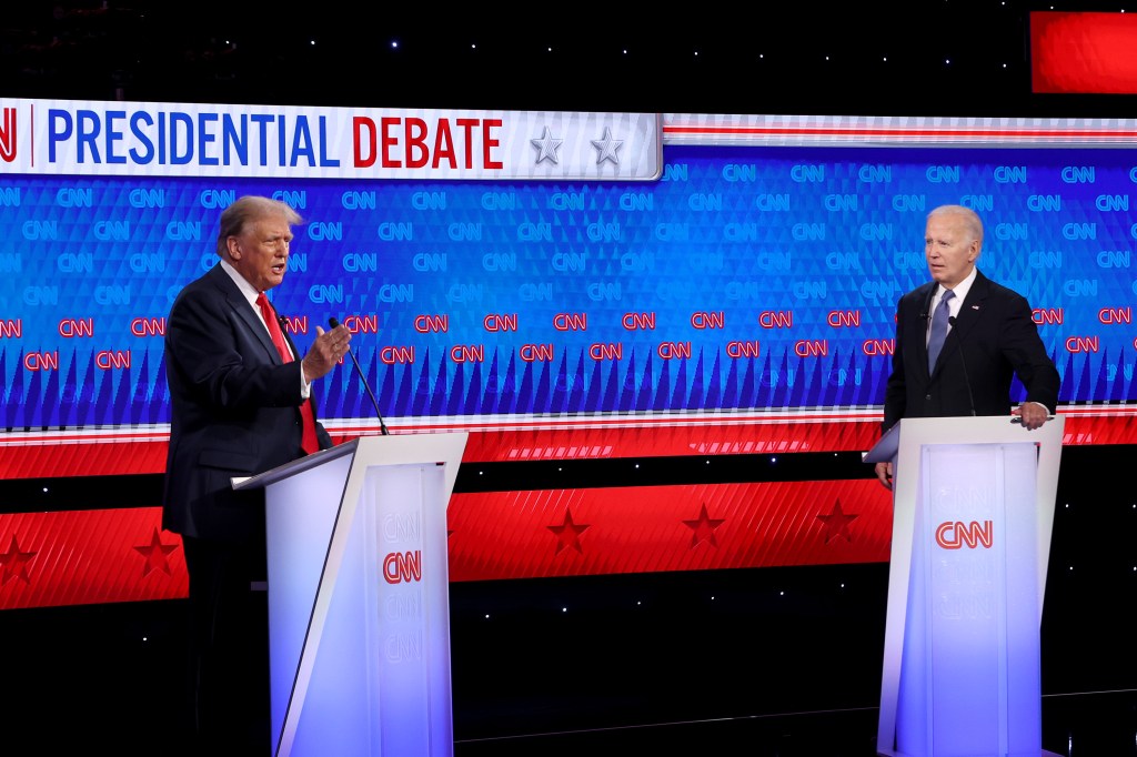 US President Joe Biden and former US President and Republican presidential candidate Donald Trump participate in the first presidential debate of the 2024 elections at CNN's studios in Atlanta, Georgia, on June 27, 2024.