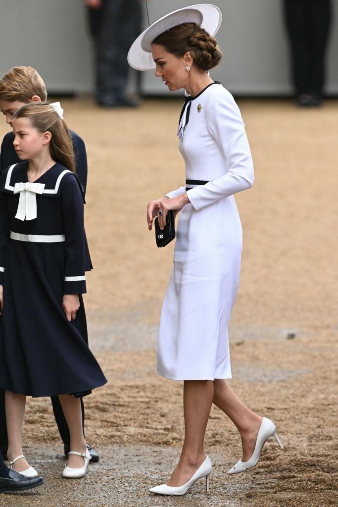 The Princess of Wales steps out of the carriage with her kids after her arrival to the Horse Guards Parade.