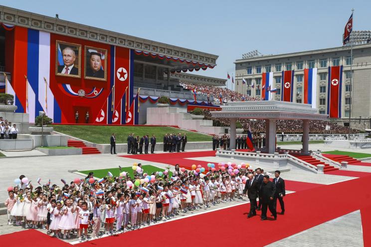 Russian President Vladimir Putin, and North Korea's leader Kim Jong Un, attend the official welcome ceremony in the Kim Il Sung Square in Pyongyang, North Korea, on Wednesday, June 19, 2024.