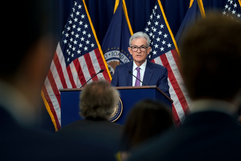 man talking at a podium