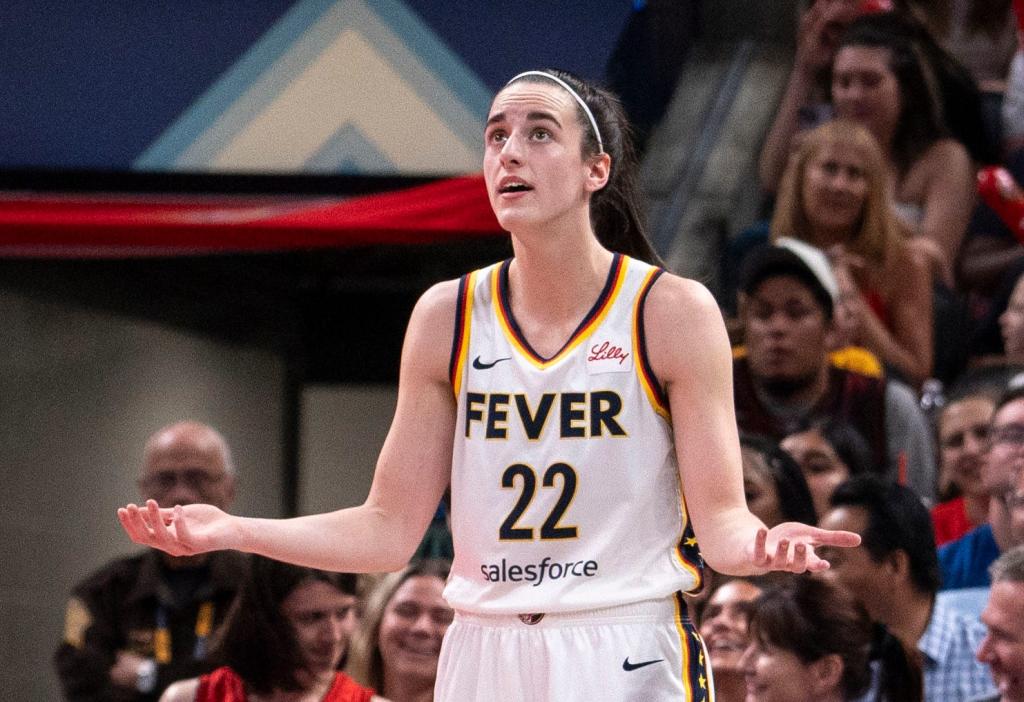 Indiana Fever guard, Caitlin Clark, reacting in disappointment after a foul during a game against the Washington Mystics at Gainbridge Fieldhouse, Indianapolis.