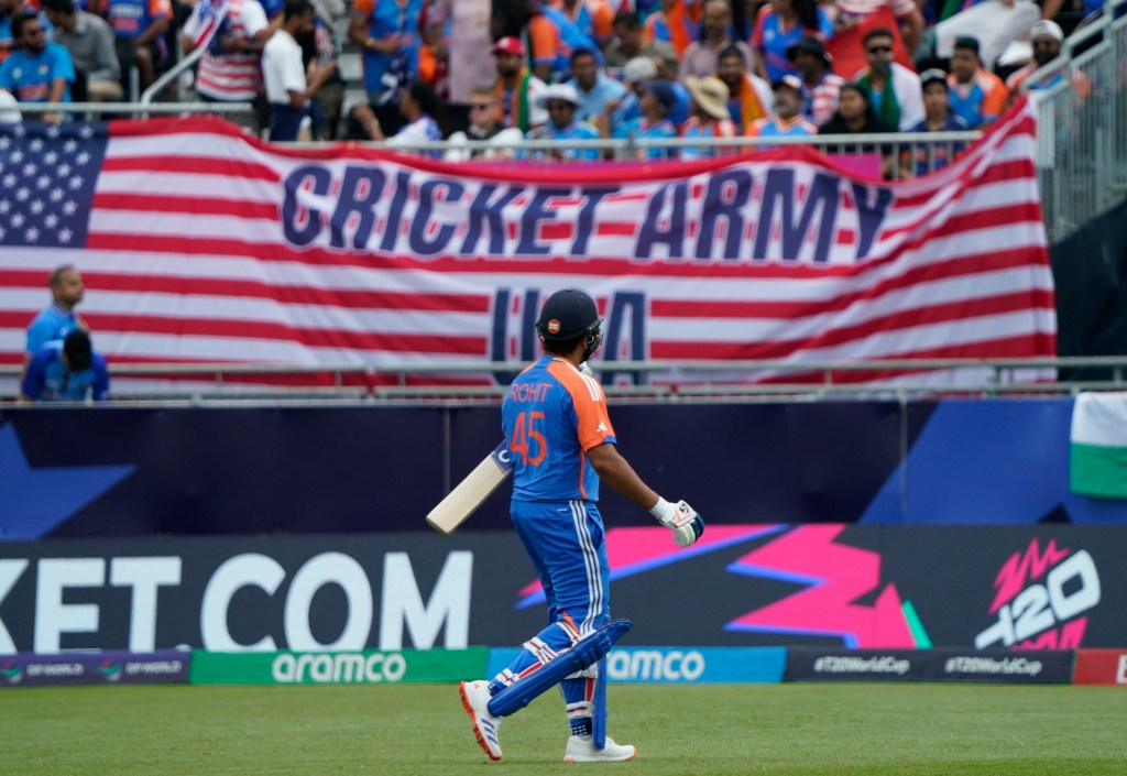 India's captain Rohit Sharma walks off the field after being caught out during the ICC men's Twenty20 World Cup 2024 group A cricket match between the USA and India at Nassau County International Cricket Stadium in East Meadow, New York, on June 12, 2024