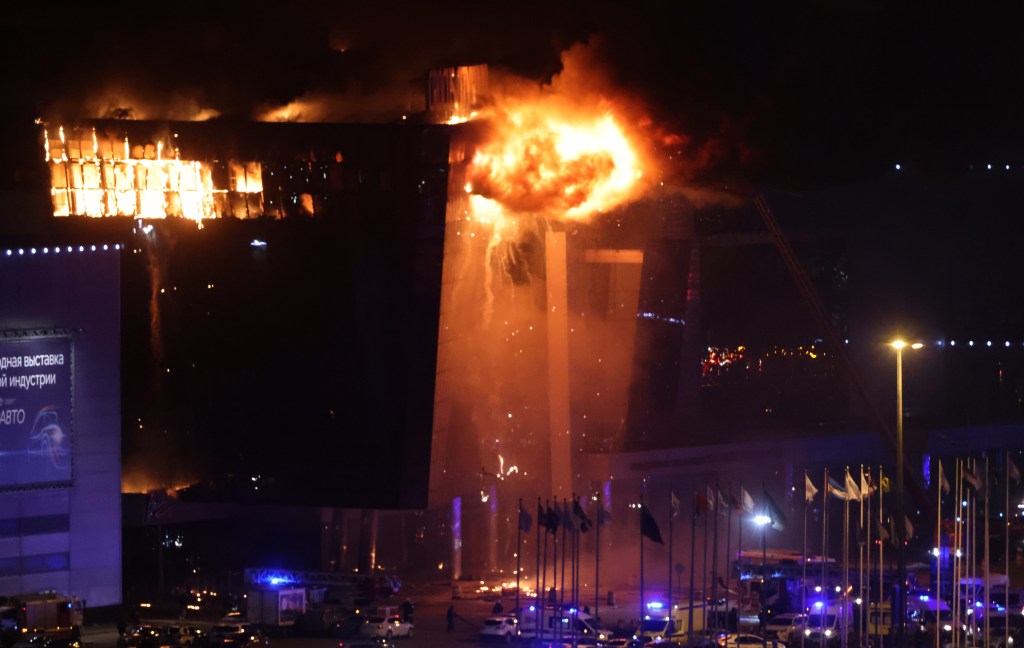 A fire rages at the Crocus City Hall building after ISIS-K terrorists attacked the building and concert-goers.