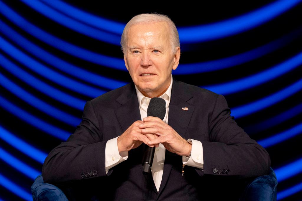 President Joe Biden is seated during a campaign event with former President Barack Obama, June 15, 2024, in Los Angeles