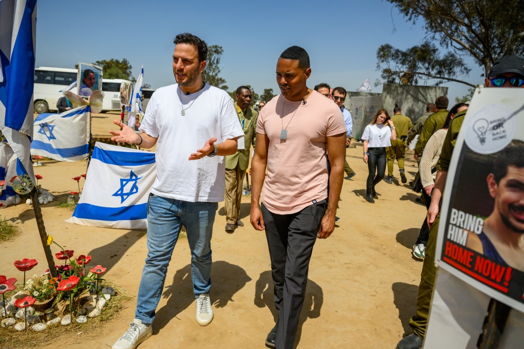 Torres speaking to Nova festival survivor Ofir Amir during a visit to the memorial for the victims of the terror attack in Re'im Israel on April 1, 2024.