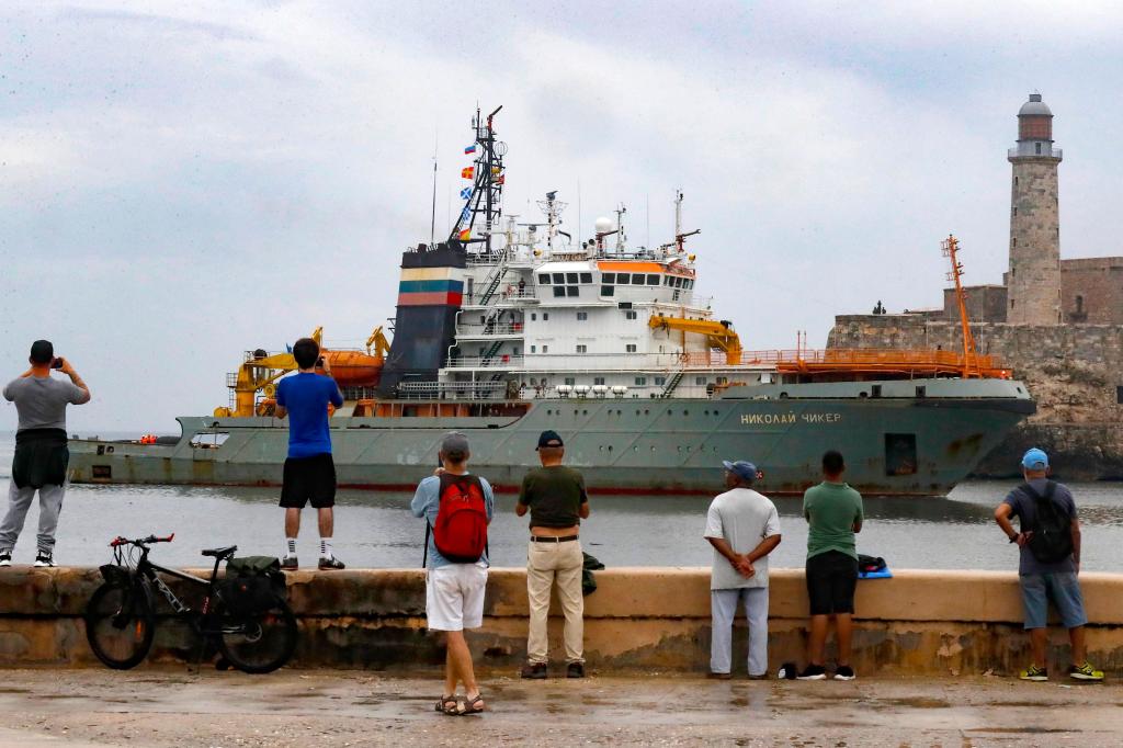 Four warships arrive in Cuba as locals line up to see the Russian fleet.