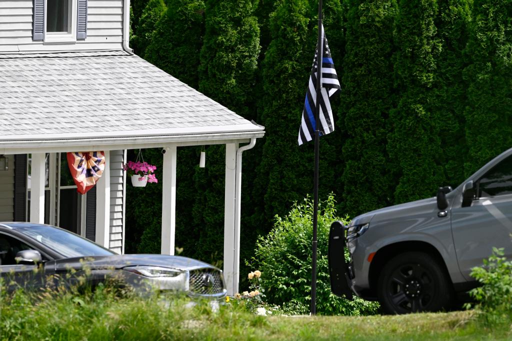 Thin blue line flag outside slain cop's home in Connecticut