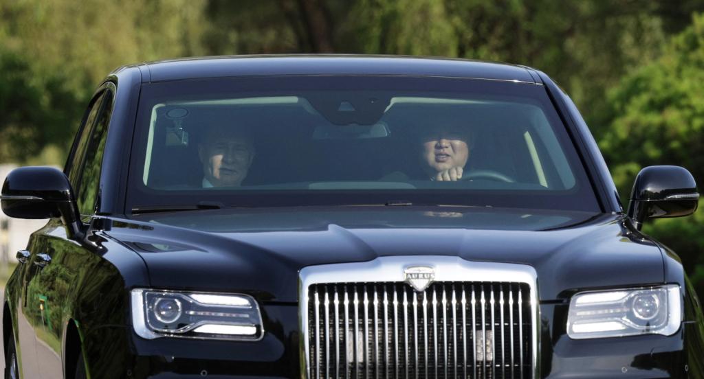 Kim Jong Un takes the wheel of his new Aurus Senat, alongside Vladimir Putin.