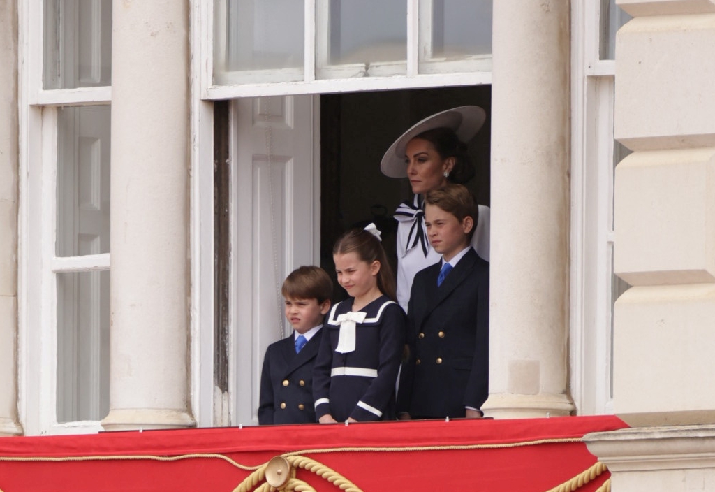 Royal fans were heartened to see the three children standing alongside their mom. 