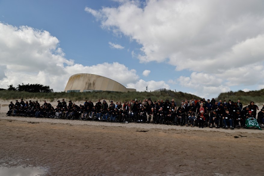 US war veterans attend a wreath-laying ceremony at Utah Beach, Normandy on Wednesday, June 5, 2024.