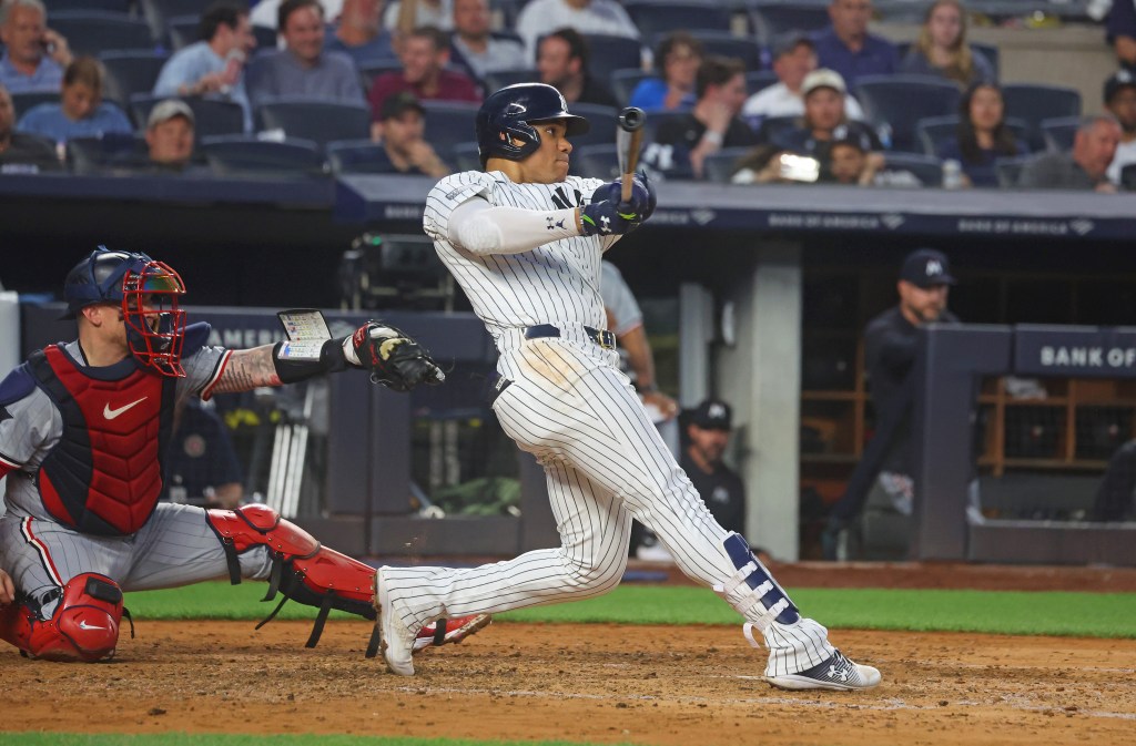 New York Yankees outfielder Juan Soto (22)  flied out to shallow left during the fourth inning when the New York Yankees played the Minnesota Twins