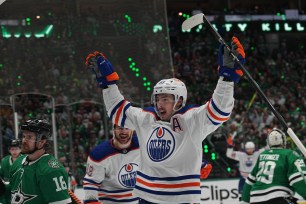 Ryan Nugent-Hopkins of the Oilers celebrates a goal against the Stars on Friday night in Dalllas.