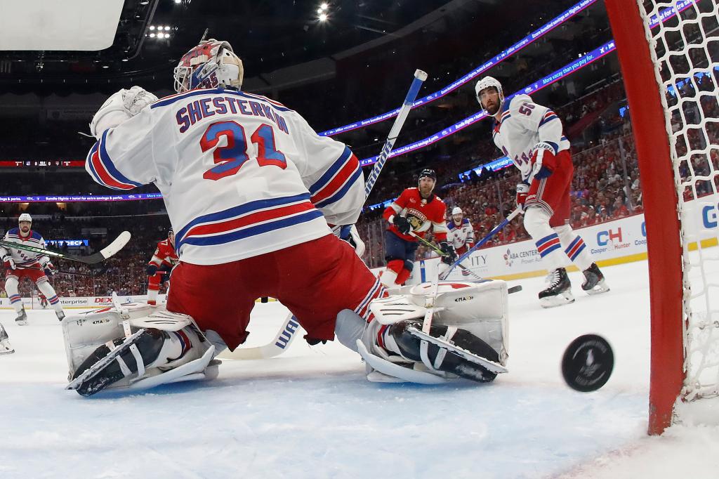 Sam Bennett #9 of the Florida Panthers scores against Goaltender Igor Shesterkin #31 of the New York Rangers in Game Six of the Eastern Conference Final at the Amerant Bank Arena on June 1, 2024 in Sunrise, Florida.