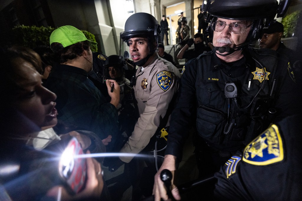 face pro-Palestinian protesters outside Dodd Hall in the University of California at Los Angeles (UCLA) in Los Angeles, June 10, 2024.