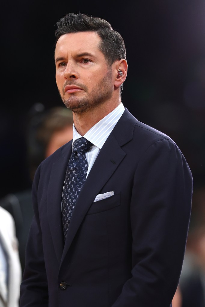 JJ Redick dressed in a suit prior to Game Two of the 2024 NBA Finals between the Boston Celtics and the Dallas Mavericks at TD Garden, Boston, Massachusetts.