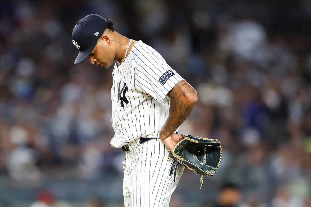 Luis Gil #81 of the New York Yankees reacts after a home run against the Los Angeles Dodgers 