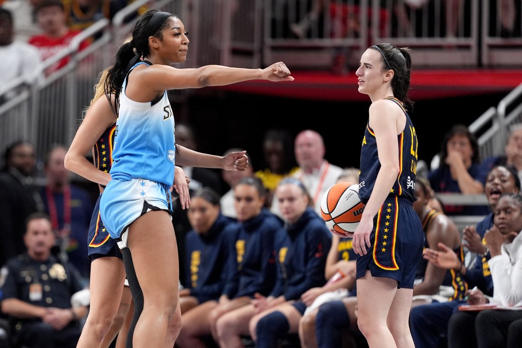 Angel Reese of the Chicago Sky reacting after fouling Caitlin Clark of the Indiana Fever during a basketball game at Gainbridge Fieldhouse, Indianapolis.