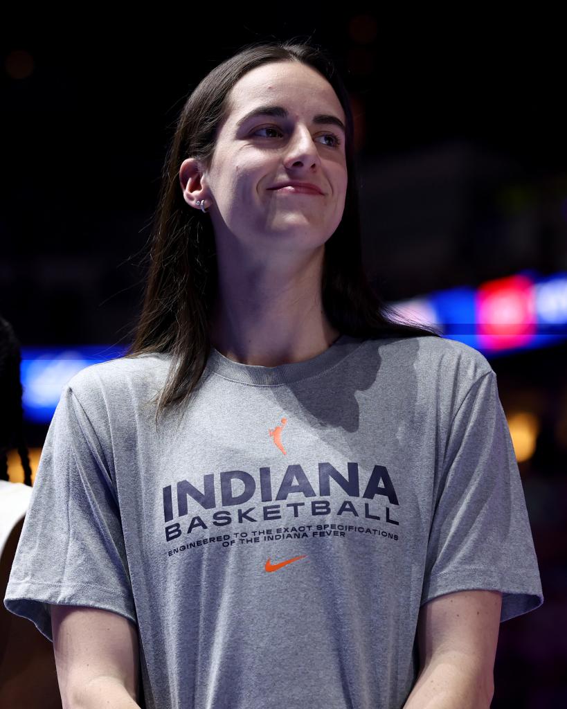 Caitlin Clark and the Indiana Fever are recognized before the evening session on Day Four of the 2024 U.S. Olympic Team Swimming Trials at Lucas Oil Stadium on June 18, 2024 in Indianapolis, Indiana.