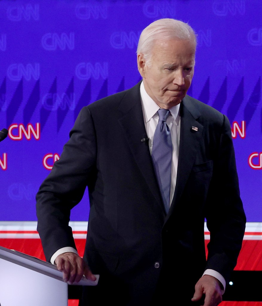 Biden walks off stage during the CNN Presidential Debate at the CNN Studios on June 27, 2024 in Atlanta, Georgia.