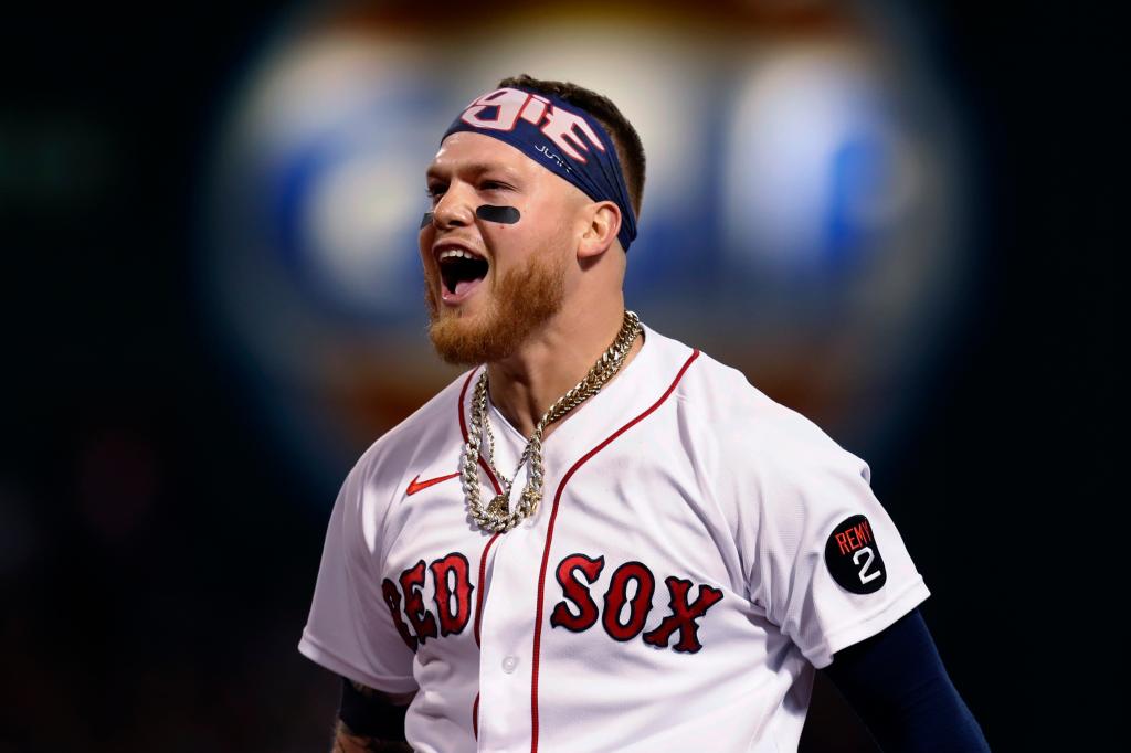 Boston Red Sox's Alex Verdugo celebrates after hitting a two-run single against the New York Yankees during the 10th inning of a baseball game Saturday, July 9, 2022, in Boston. The Red Sox won 6-5. 