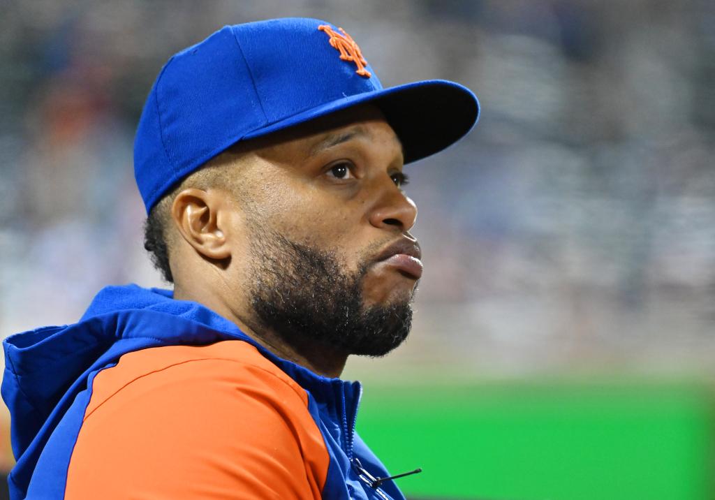 Robinson Cano in a New York Mets uniform on the baseball field