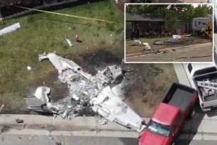 Four people suffered burns after the plane crashed in a residential neighborhood outside of Denver.