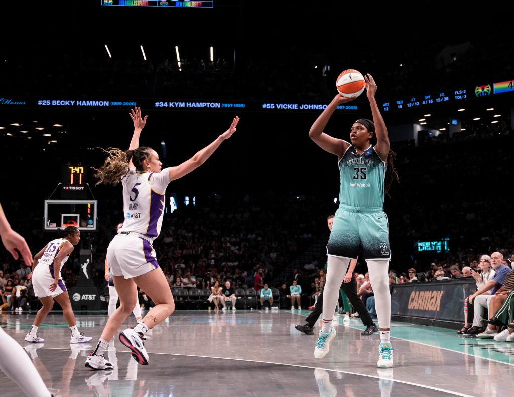 Jonquel Jones shoots a 3-pointer during a New York Liberty game against the Los Angeles Sparks at Barclays Center.