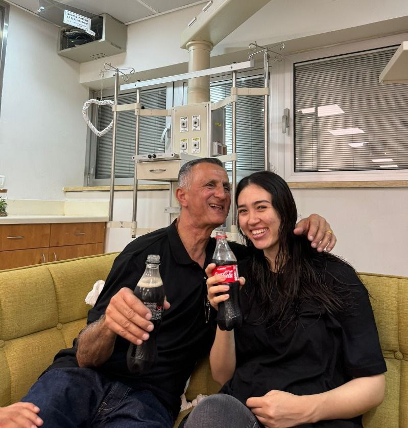 Noa Argamani is seen here with her father in a hospital.