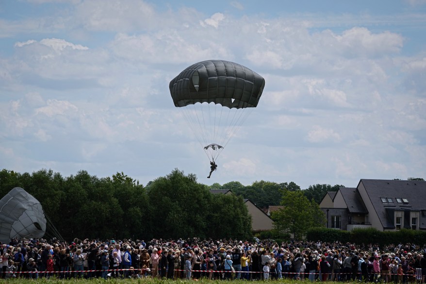 400 British, Belgian, Canadian and US paratroopers take part in a parachute drop to commemorate the contribution of airborne forces on D-Day. as part of the 80th anniversary of D-Day, in Sannerville, Normandy, France, Wednesday, June 5, 2024.