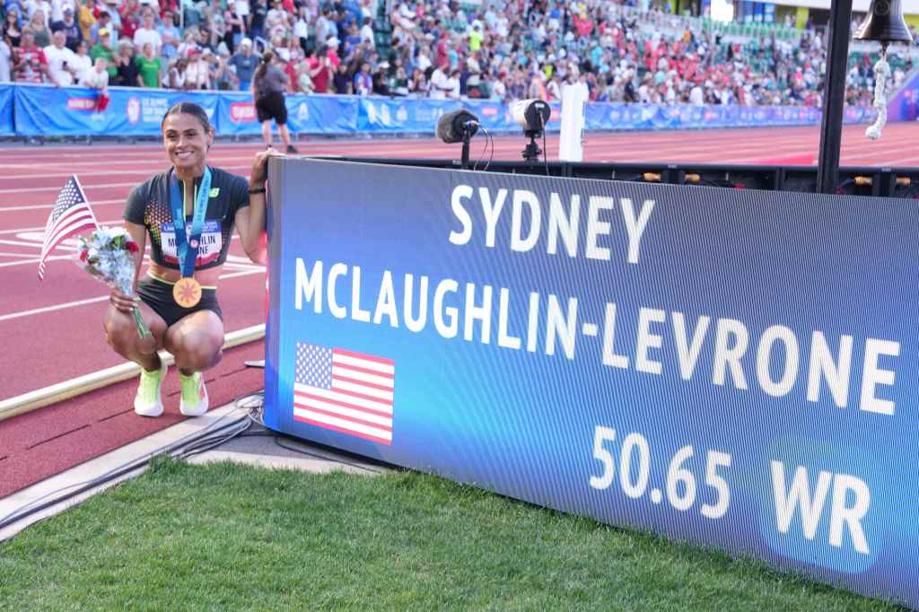 Sydney McLaughlin-Levrone poses after winning the women's 400m hurdles in a world record 50.65. 