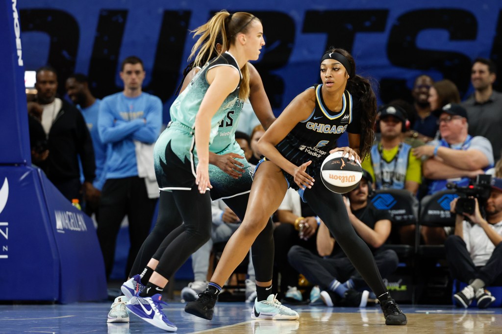 Chicago Sky forward Angel Reese (5) controls the ball against the New York Liberty during the first half on Tuesday.