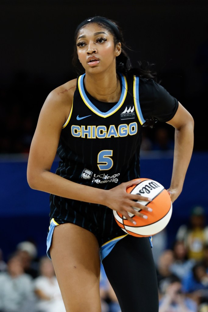 Sky forward Angel Reese (5) looks to pass the ball against the Indiana Fever during the second half of a basketball game at Wintrust Arena on June 23, 2024. 