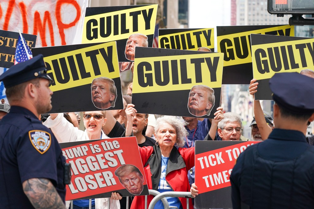 On 5th ave, mhtn., around perimeter of Trump Tower. Protesters show up displaying signage and some offer their opinions the day after a historic verdict.