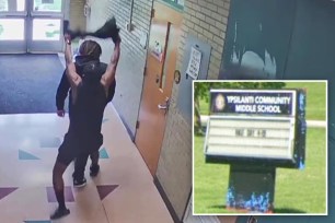 A teen was choked by a coach in the hallway of his Michigan middle school.