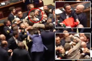 A video has captured a wild brawl erupting in Italy’s parliament that reportedly forced a lawmaker to leave the chamber in a wheelchair. 