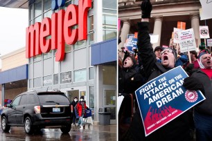 People wear face masks as they leave a Meijer store in Detroit, Michigan on April 7, 2020