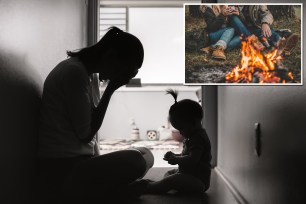 mom stressed with kid couple at campfire