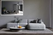 A grey couch in a room