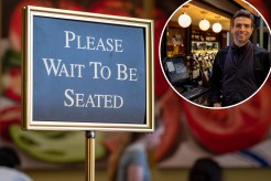 Please wait to be seated sign