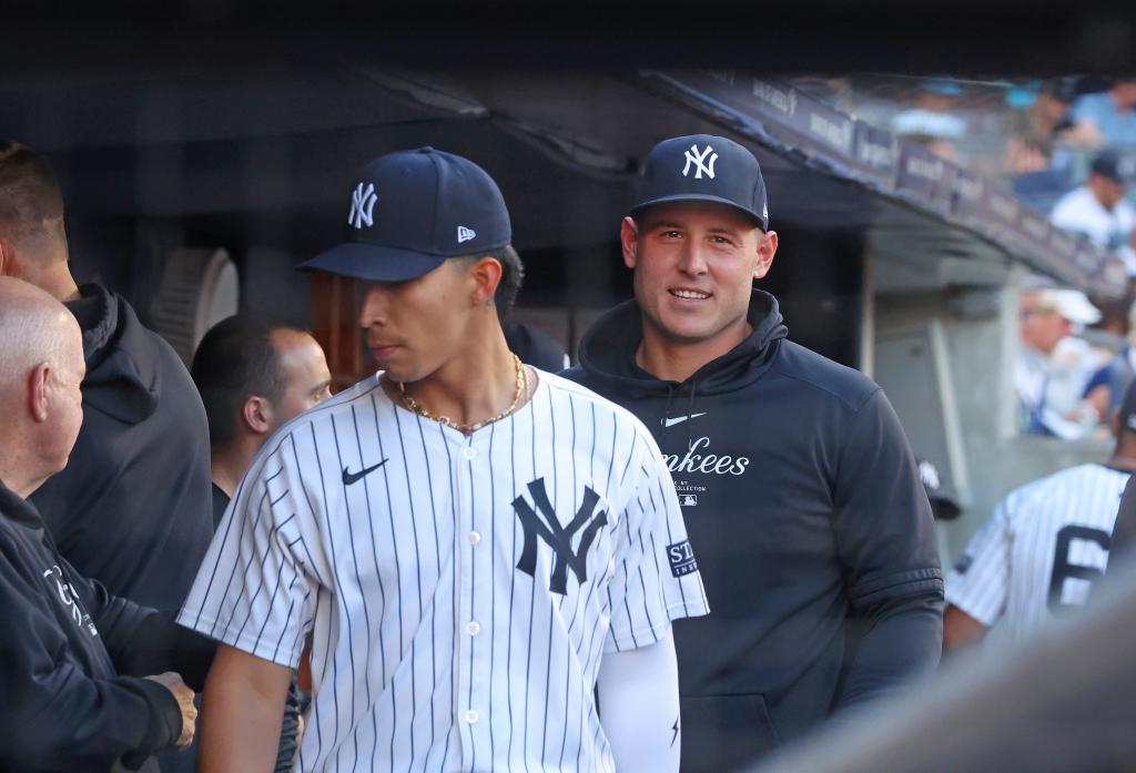 Oswaldo Cabrera #95 of the New York Yankees and Anthony Rizzo #48 of the New York Yankees in the dugout before the start of the game when the New York Yankees played the Los Angeles Dodgers Sunday.