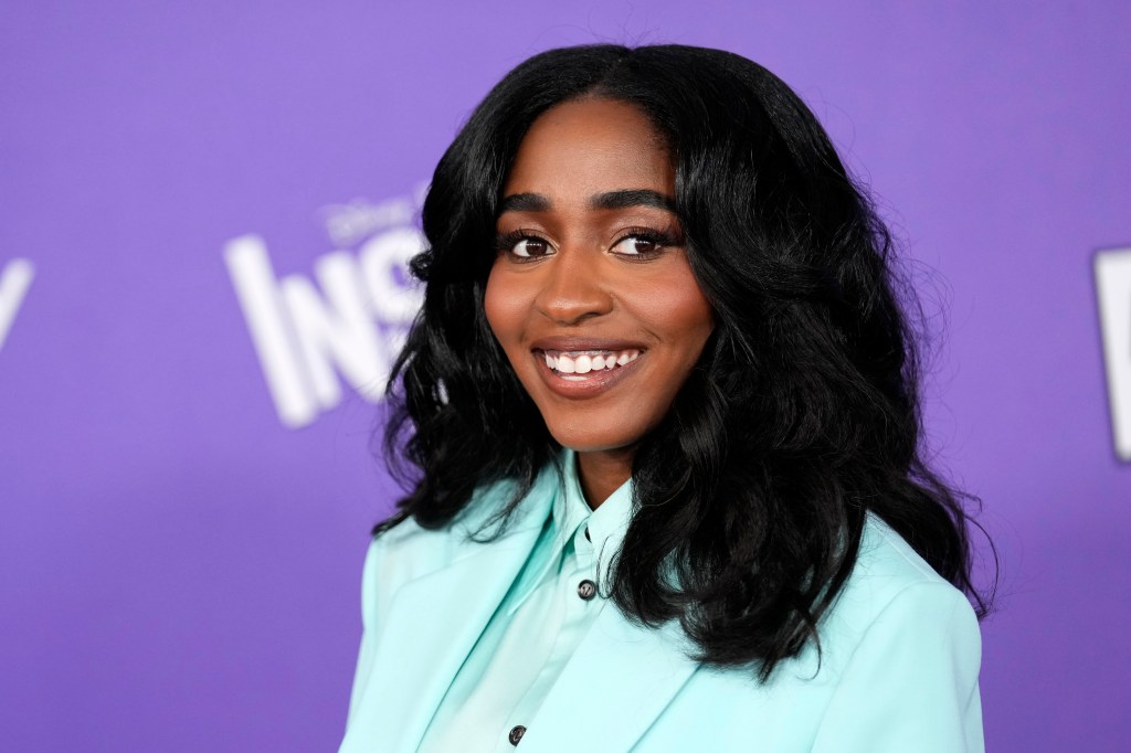 Ayo Edebiri smiling at the camera at the premiere of 'Inside Out 2' at the El Capitan Theatre in Los Angeles, June 10, 2024