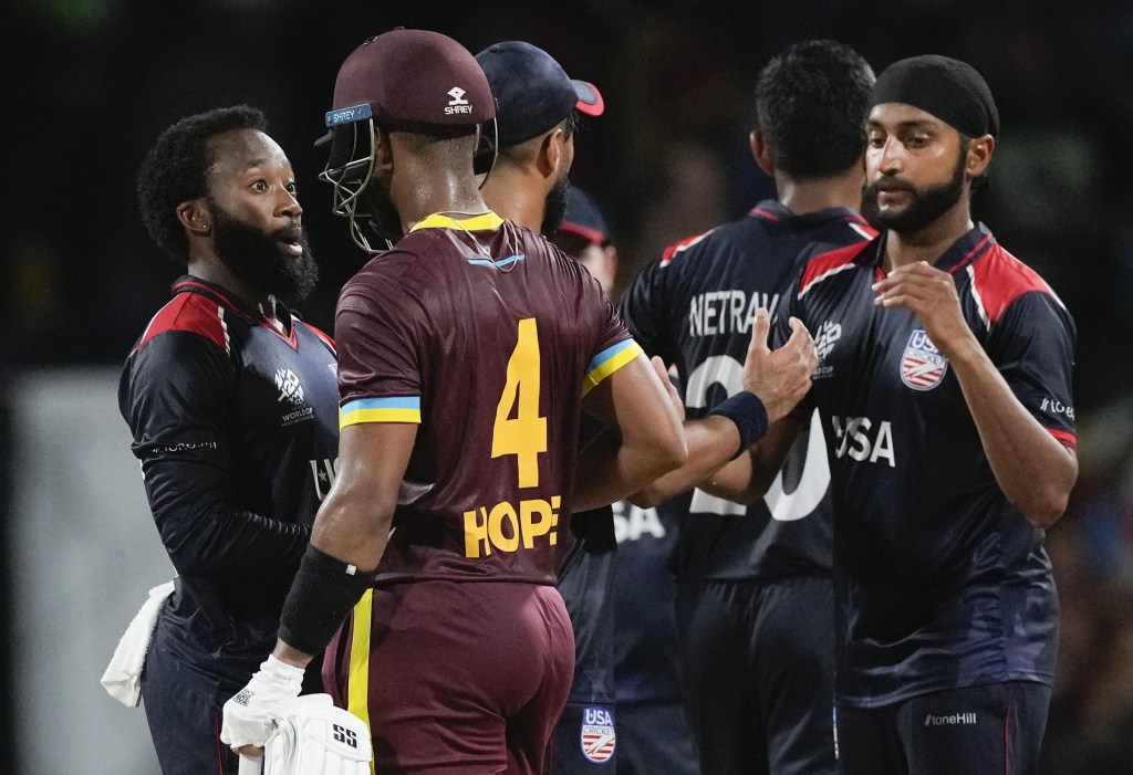 nited States cricket skipper Aaron Jones (left) congratulates Shai Hope after their loss to West Indies.