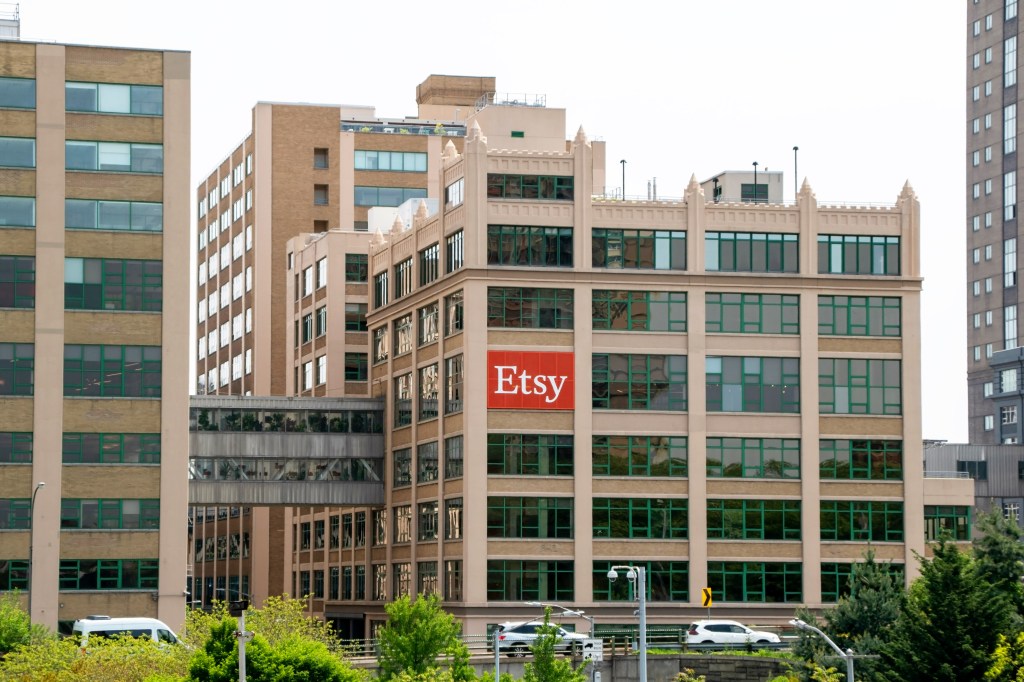 A large building in Brooklyn Heights with a red Etsy sign, viewed from the Brooklyn Bridge on March 13, 2023.