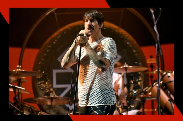 Red Hot Chili Peppers frontman Anthony Kiedis sings onstage.