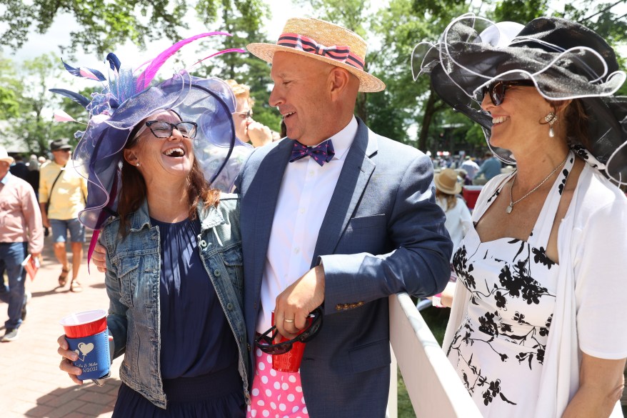 Margaret and Matthew Woods, along with Theresa Cocuzza attend the festivities in full attire. 