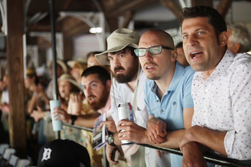 Fans John Stark and Andrew Bamberg watch the races with excitement. 