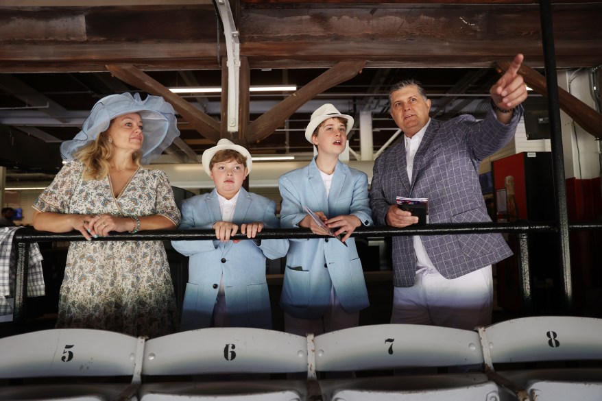 Lyman Reed, right, with wife, Nicole and sons, Cole, 11yrs, and Blake, 14 yrs, of Oswego, NY at Saratoga, Belmont Stakes.