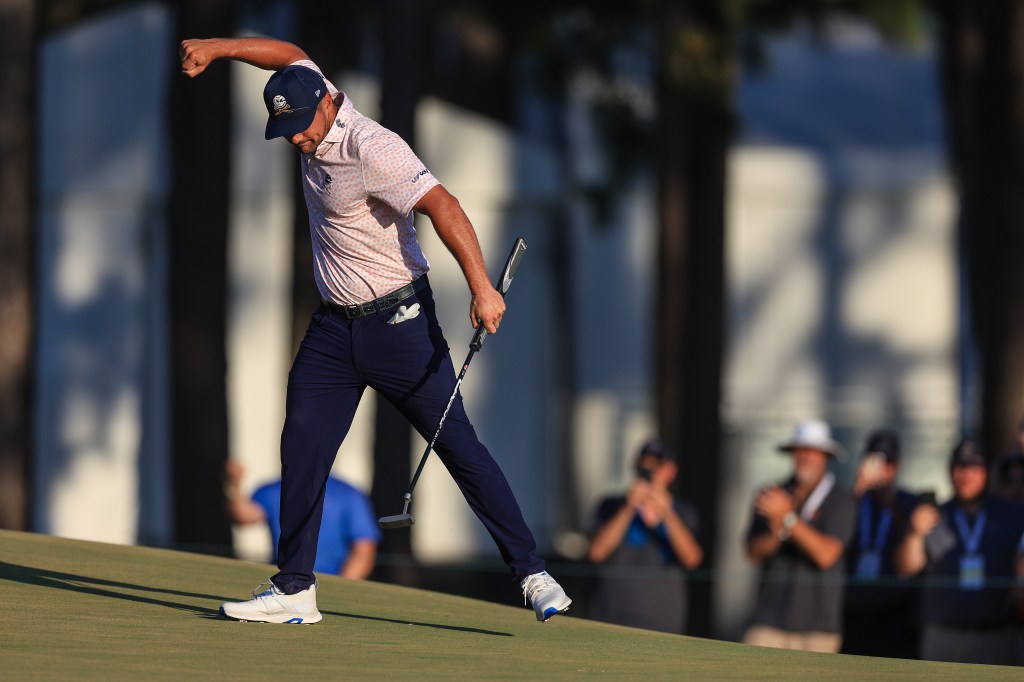 Bryson DeChambeau pumps his fist after making a birdie on the 14th hole during the third round of the U.S. Open.